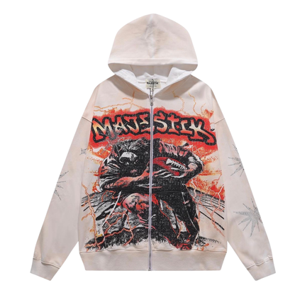 A cream-colored zip-up hoodie featuring a large graphic print of a wolf with the word 'MAJESTICK' in a red graffiti-style font across the chest.